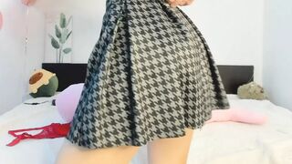 short skirt, red bra strip and finger in pussy