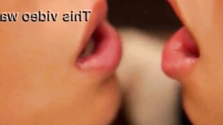 Girl on girl close-up kiss
