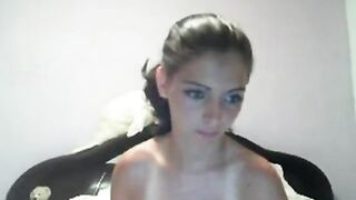Latina chick strips and dances in front of her webcam