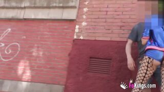 Horny babe teases guys and sucks their cocks in the street