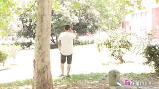 Horny babe teases guys and sucks their cocks in the street