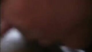 Sexy ebony honey on brown couch sucking and fucking by two big dicks