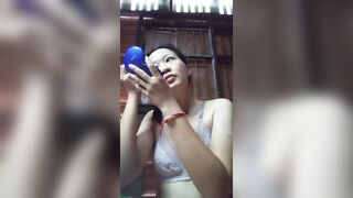Asian girl at home alone