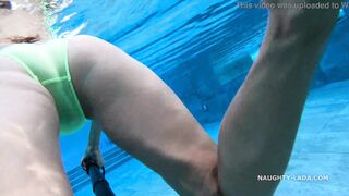 My transparent when wet one piece swimwear in public pool