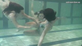 Sexy young teens swirl in the water