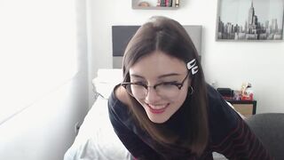 Cute nerdy Colombian girl pulls down her jeans and panties