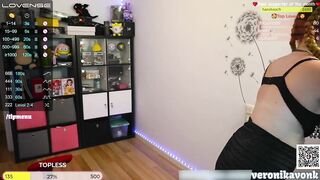 Nerdy Gothic girl with a heavy metal bra with Spikes