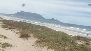 Pissing on my slut at the beach
