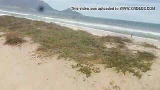 Pissing on my slut at the beach
