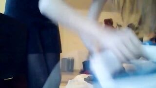 hacked laptop camera. girl puts on pantyhose