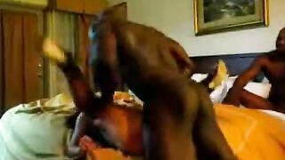 Asian wife fucks two big black dicks in hotel
