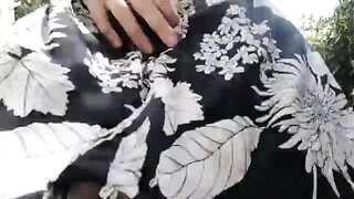 Video of squirting with huge black dildo in a dirty public park