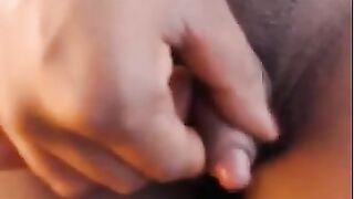 Playing with her big clit