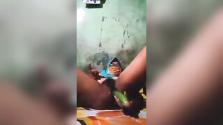 tudung slut slide cucumber in her pussy