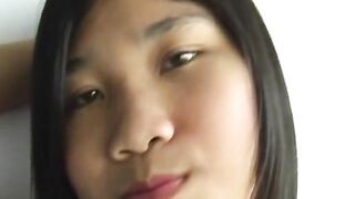 Cute Asian teen strips to reveal her perky little titties
