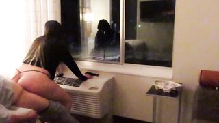 Having fun wearing a see through short dress in hotel public areas