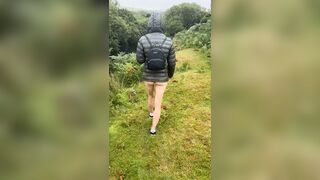 A saucy teen walking through mother nature.