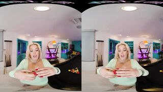 Seductive blonde with big boobs gives you a steamy show in VR