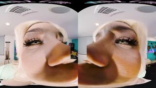Seductive blonde with big boobs gives you a steamy show in VR