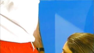 A brunette lifeguard pleases her pussy while working