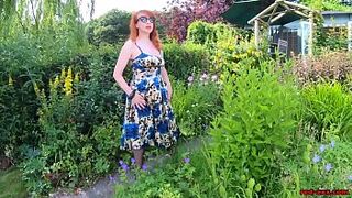 Busty babe Red XXX fingers herself in the garden