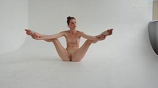 Dressed flexible brunette Alla Sinichka