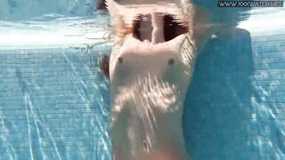 Sexy Nicole Pearl with small tits in the pool