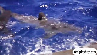 Badass babes swam in shark cage and snowboarding while naked