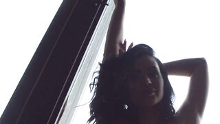 Sensual amateur brunette teasing in exclusive erotic video
