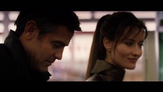 Natascha McElhone and George Clooney make love passionately