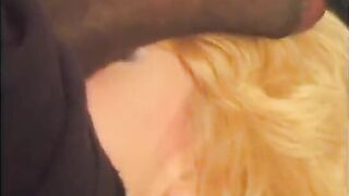 Black dude leans back so b-cup brunette Nancy Vee can suck his huge cock and balls