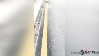 Shameless Asian slut fucks herself outdoors in public