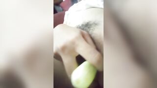 Asian girl bored to be at home alone playing with fruit