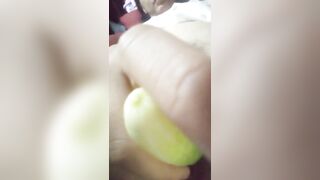 Asian girl bored to be at home alone playing with fruit
