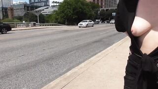 exhibitionist girl shows boobs in public