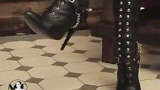 Leather Mistress Preparing A Session