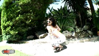 Nice MILF brunette Lyna Cypher doing a hot striptease in the wild