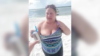 Slutty Bbw duca wife flashes her big tits on a public beach