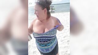 Slutty Bbw duca wife flashes her big tits on a public beach