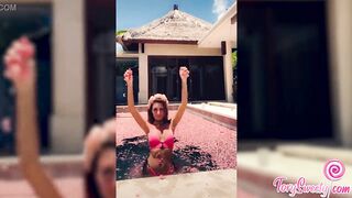 Sexy Student Play Pussy in the Pool With Flower Petals