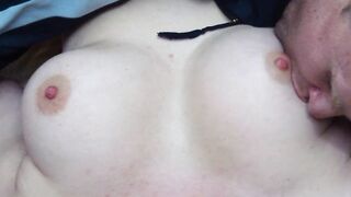 Husband licks his young wife's big natural tits and nipples