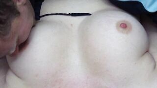 Husband licks his young wife's big natural tits and nipples