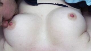 Husband licks his young wife's big natural tits and nipples