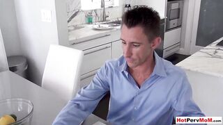 Busty MILF stepmother blows her stepson next to stepdad