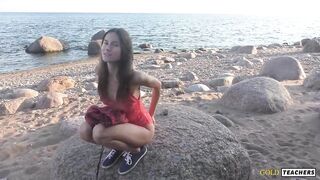POV Beautiful teen sucks cock on public beach.