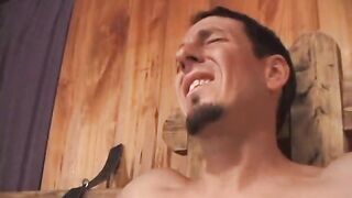 Redheaded mistress pulls weights attached to bondaged dude
