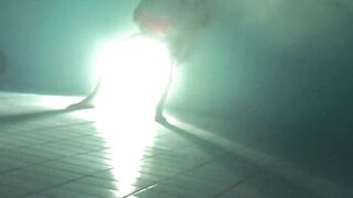 Underwater sex at the pool at night