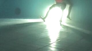 Underwater sex at the pool at night
