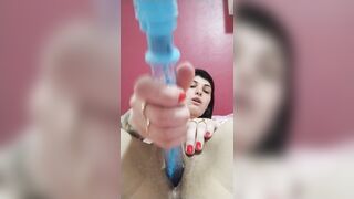 brunette punching toy in pussy