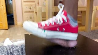 Ball crush with red Converse Chucks